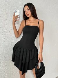 Lightweight ruffled dress with adjustable straps, perfect for beach vacations