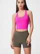 Athletic woman wearing a breathable workout tank top during yoga session