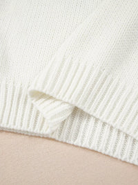 Women's Embroidered Bow Boots Drop Shoulder Sweater in cream, laid flat showing the detailed boot and bow design on the front.