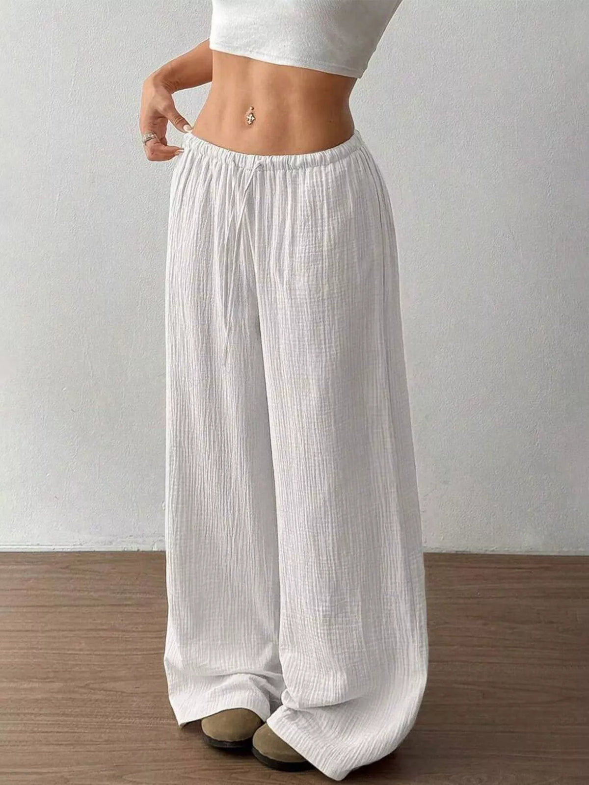 Women's plus size cotton drawstring wide leg pants in White, showing relaxed fit and tie waist.