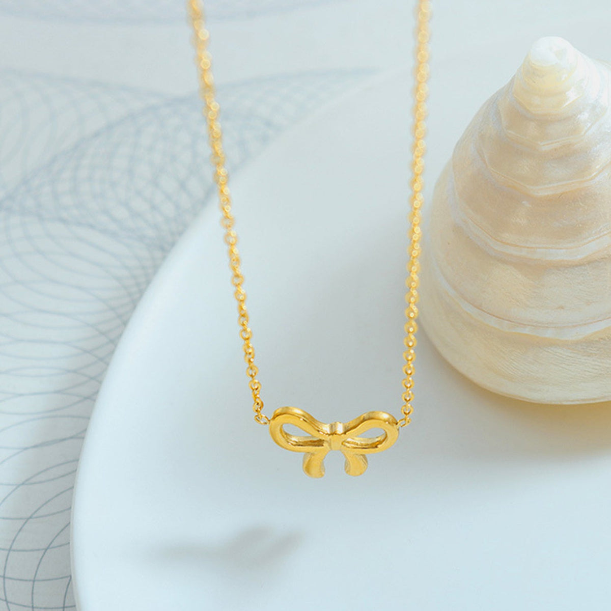 Gold-Plated Titanium Steel Bow Pendant Necklace Trandify deal