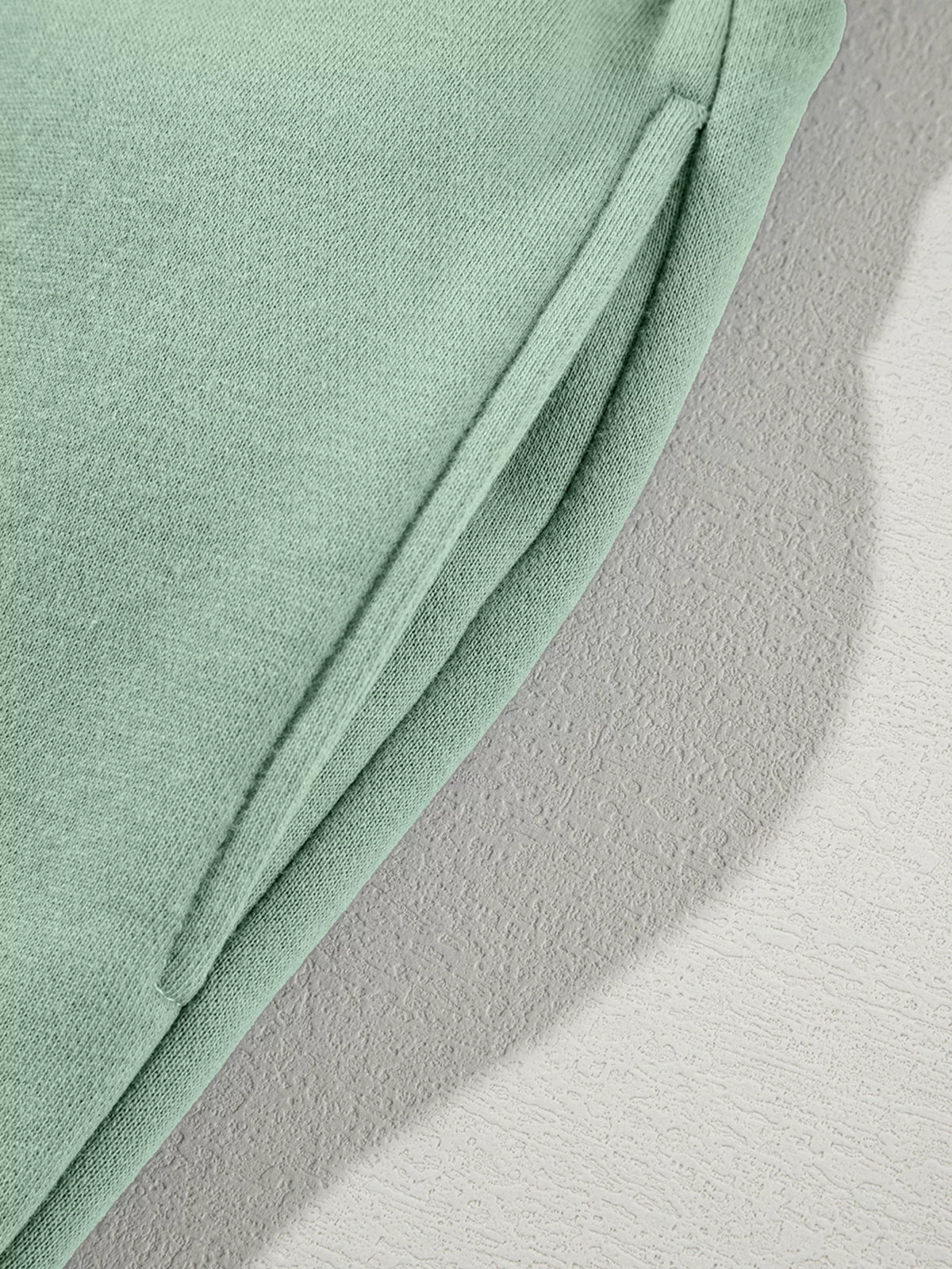Women's Zip Up Jogger Set in Sage on model showing pockets