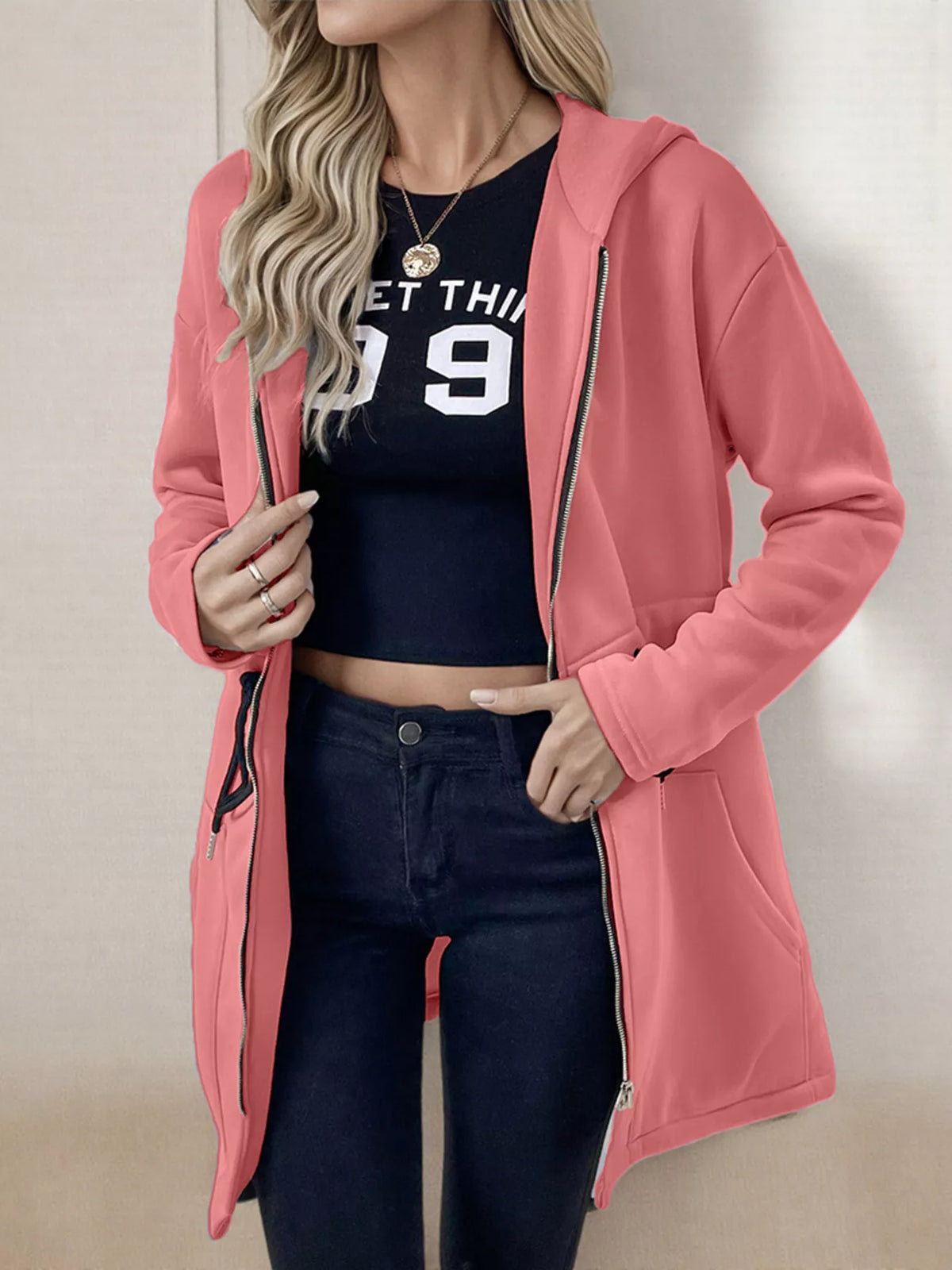 Women's lightweight zip up hoodie jacket in Pink with front pockets.