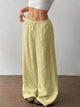 Women's plus size cotton drawstring wide leg pants, showing relaxed fit and tie waist.
