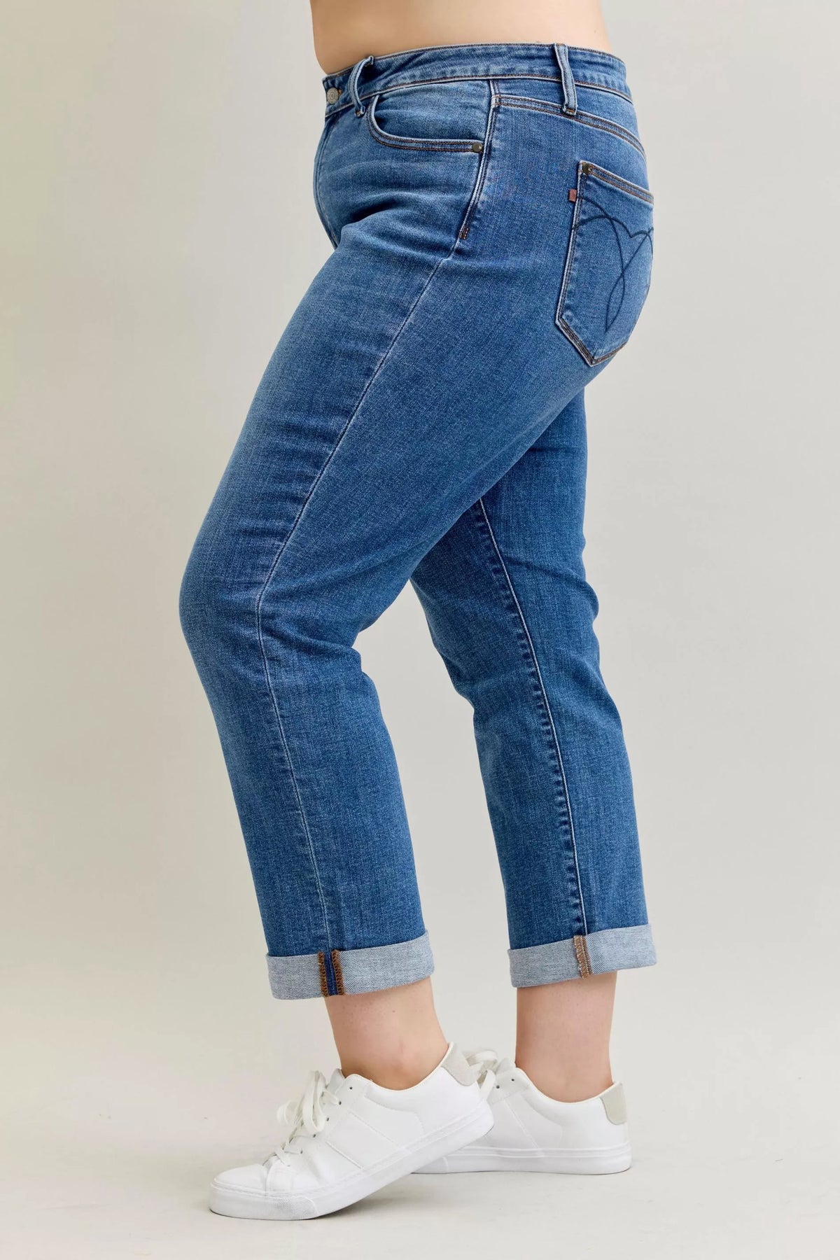 Plus Size Judy Blue Cuffed Jeans in a mid-rise, classic fit shown on a model.