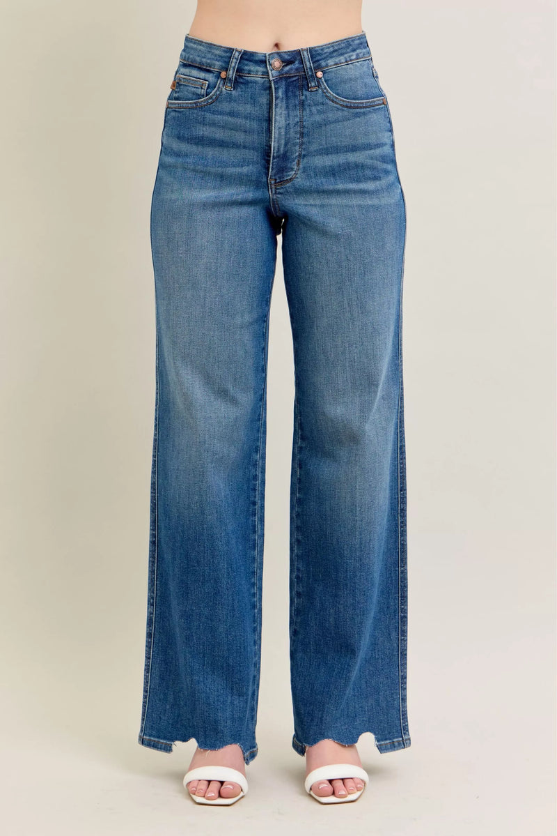 High Waist Tummy Control Jeans with Destroyed Hem on a plus-size model.