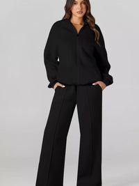 Women's Zip Up Jogger Set in Black on model showing pockets