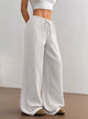 Women's plus size cotton drawstring wide leg pants in White, showing relaxed fit and tie waist.