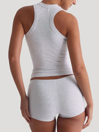 Women’s ribbed tank top and high-waisted shorts active set for gym workouts and summer lounging