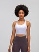 Athletic woman wearing a breathable workout tank top during yoga session