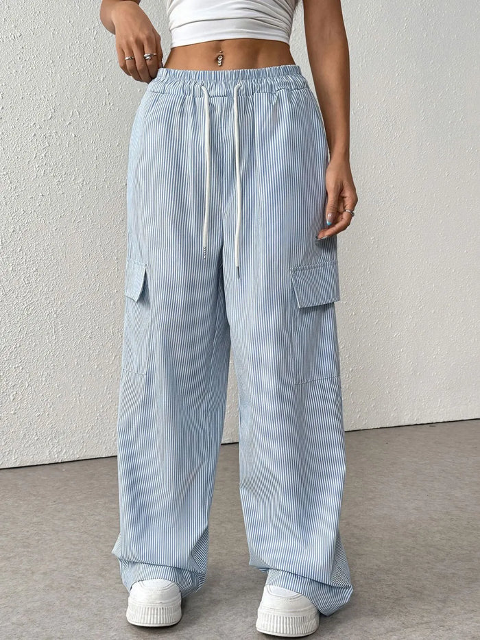 Drawstring Striped Wide Leg Cargo Pants in Light Blue shown on a model, featuring side stripes and large cargo pockets.