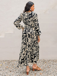 Smocked Printed Tie Neck Long Sleeve Dress Trandify Deal