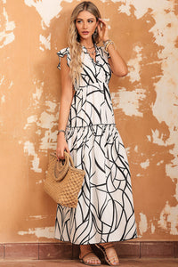 Ruffled Printed Surplice Cap Sleeve Dress Trandify deal