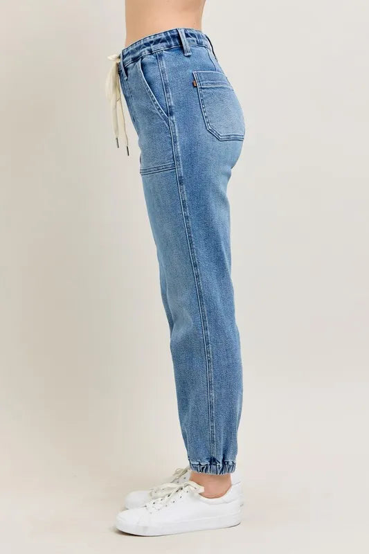 Judy Blue High Waist Denim Jogger in blue wash on model
