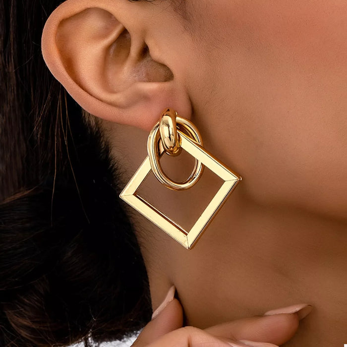 18K Gold Geometric Square Hoop Earrings displayed on a white background, showcasing their minimalist geometric design.