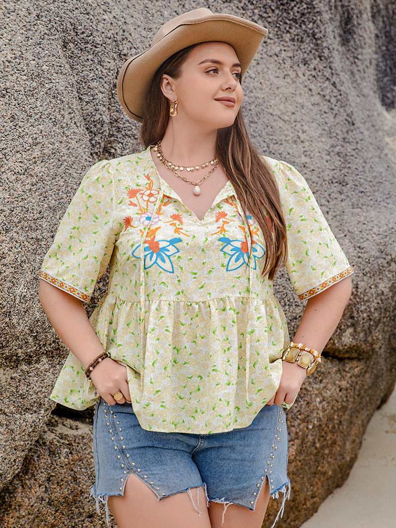 Plus Size Printed Tie Neck Half Sleeve Blouse Trandify deal