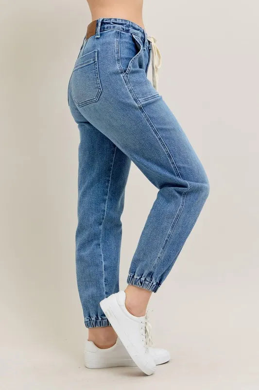 Judy Blue High Waist Denim Jogger in blue wash on model