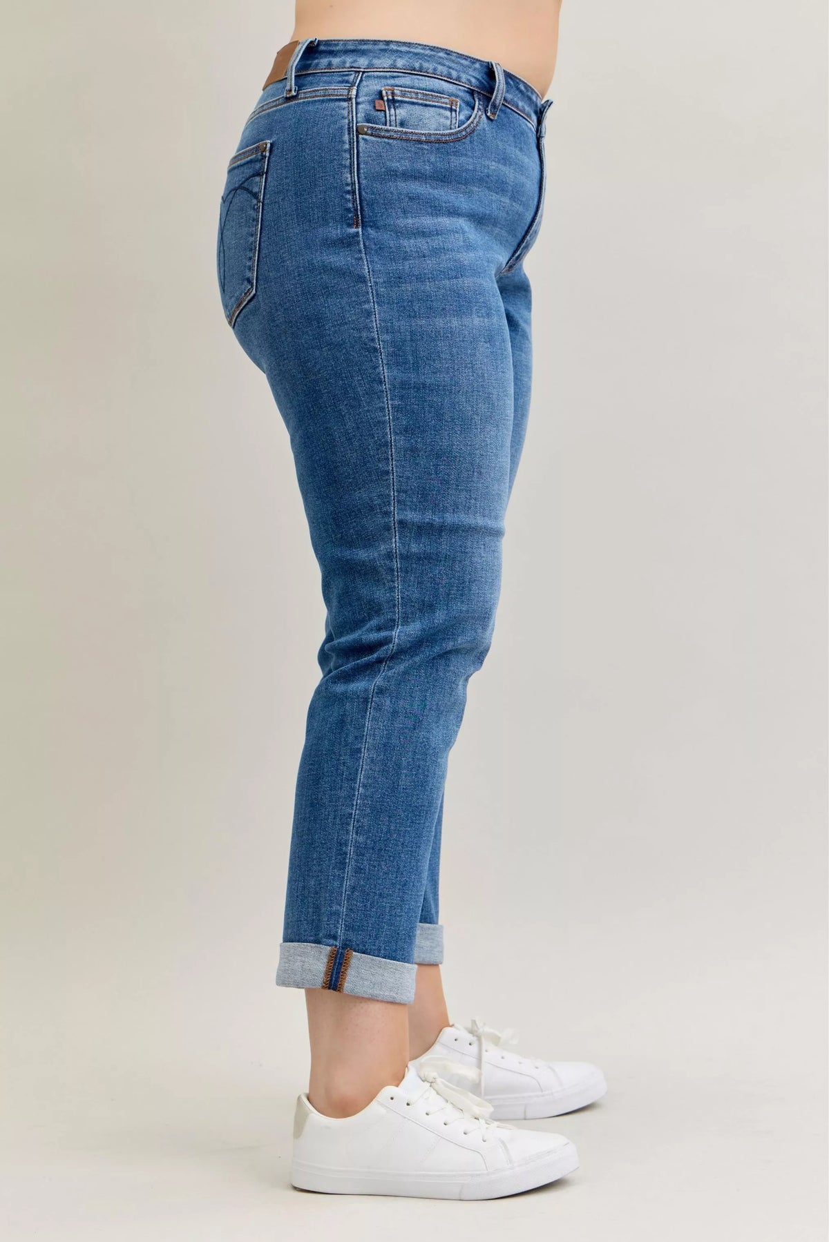 Plus Size Judy Blue Cuffed Jeans in a mid-rise, classic fit shown on a model.