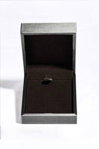 Open jewelry box ready to showcase a moissanite key pendant necklace.