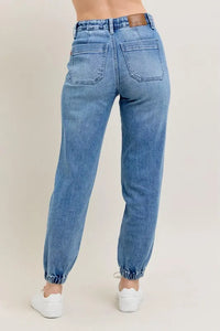 Judy Blue High Waist Denim Jogger in blue wash on model