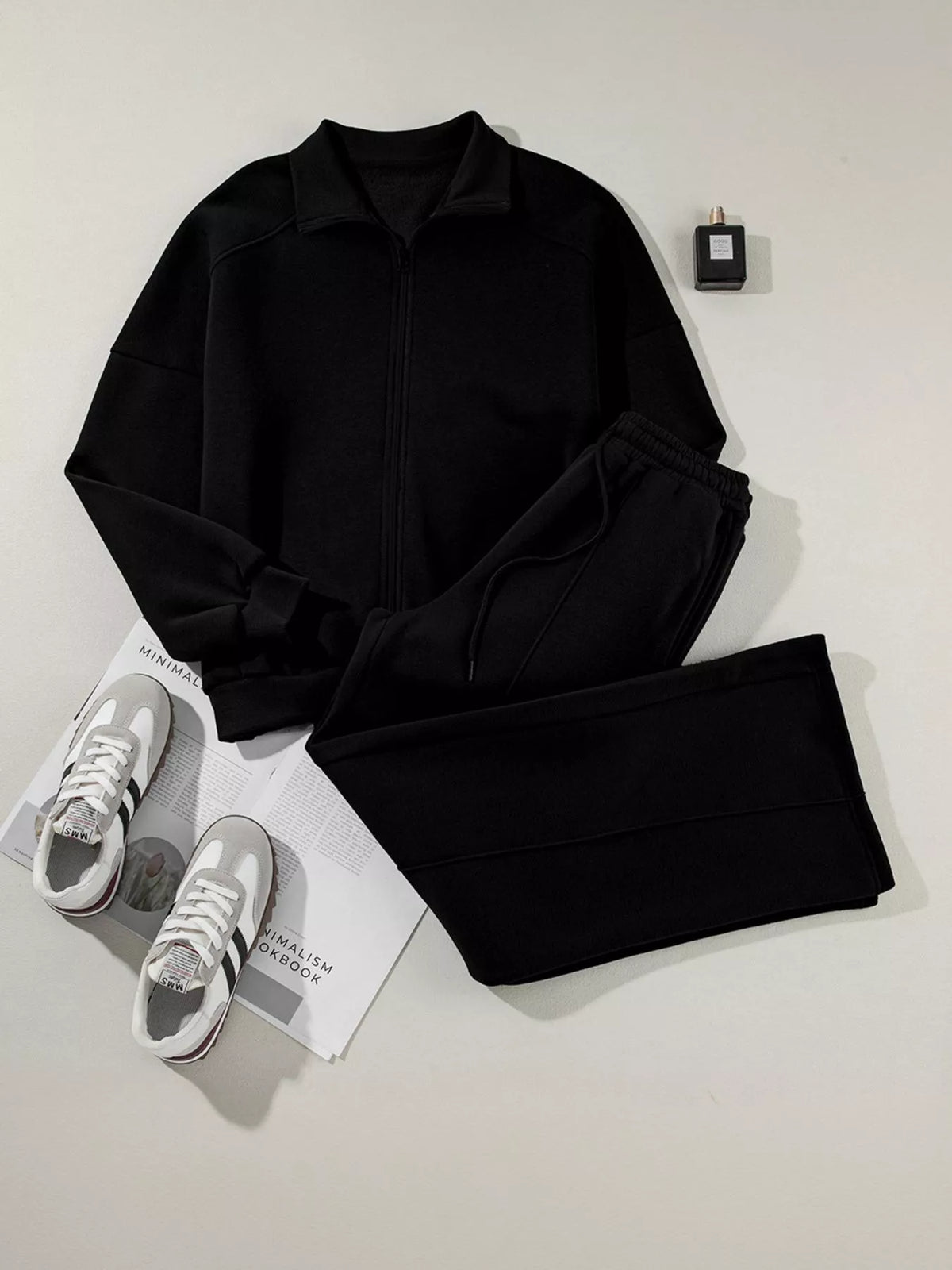 Women's Zip Up Jogger Set in Black on model showing pockets