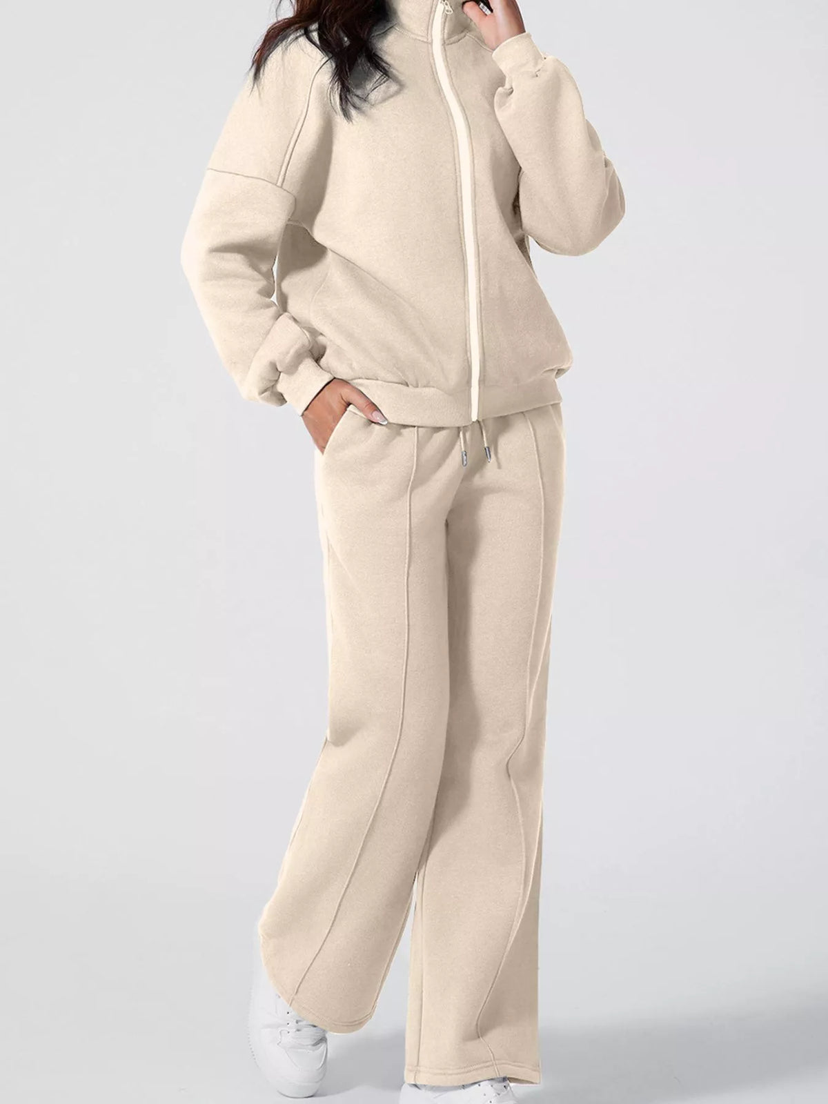 Women's Zip Up Jogger Set in Beige on model showing pockets