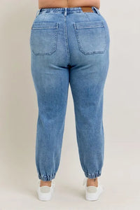 Judy Blue High Waist Denim Jogger in blue wash on model