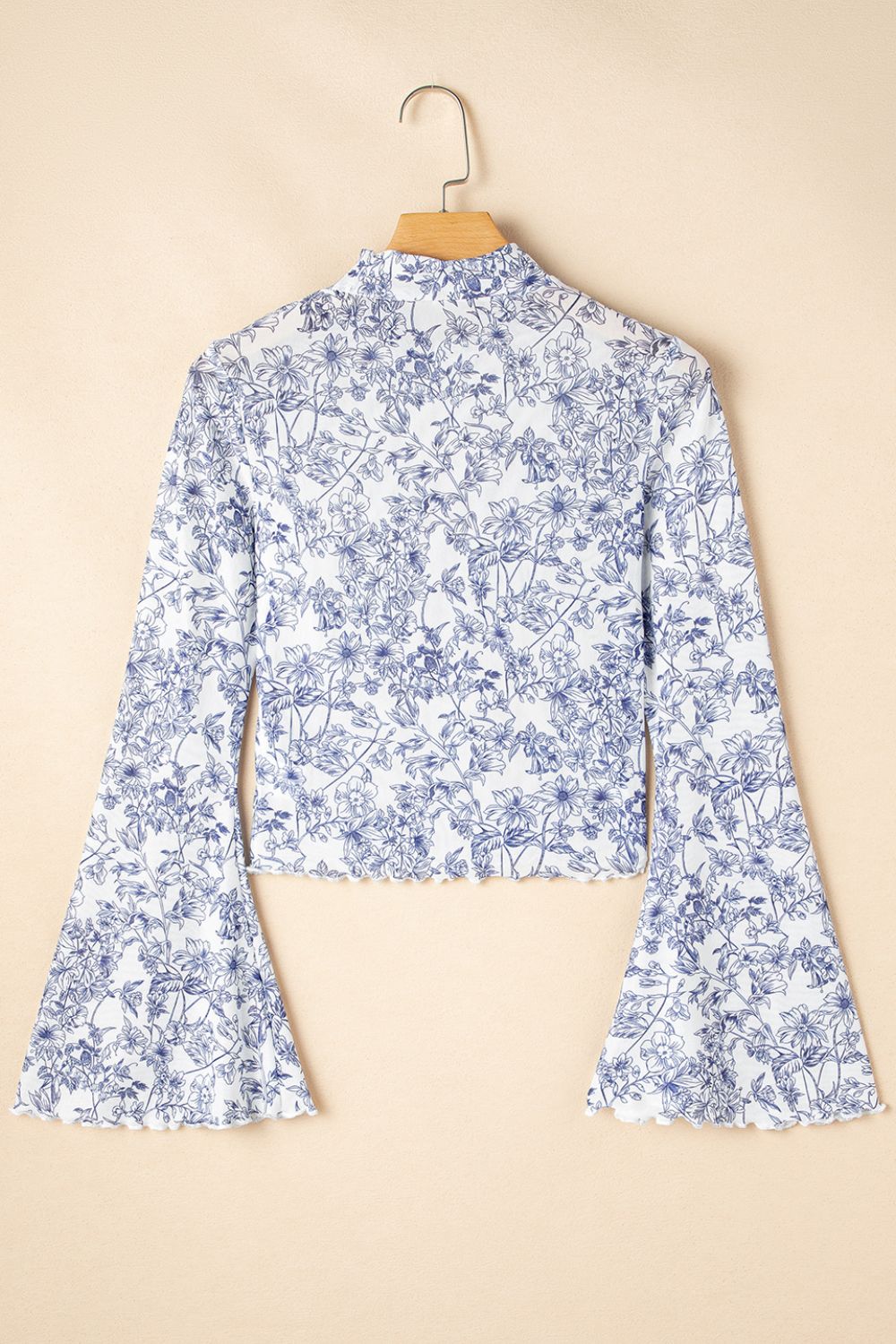 Women’s stylish mock neck blouse in floral print, U.S. fashion trend 2025