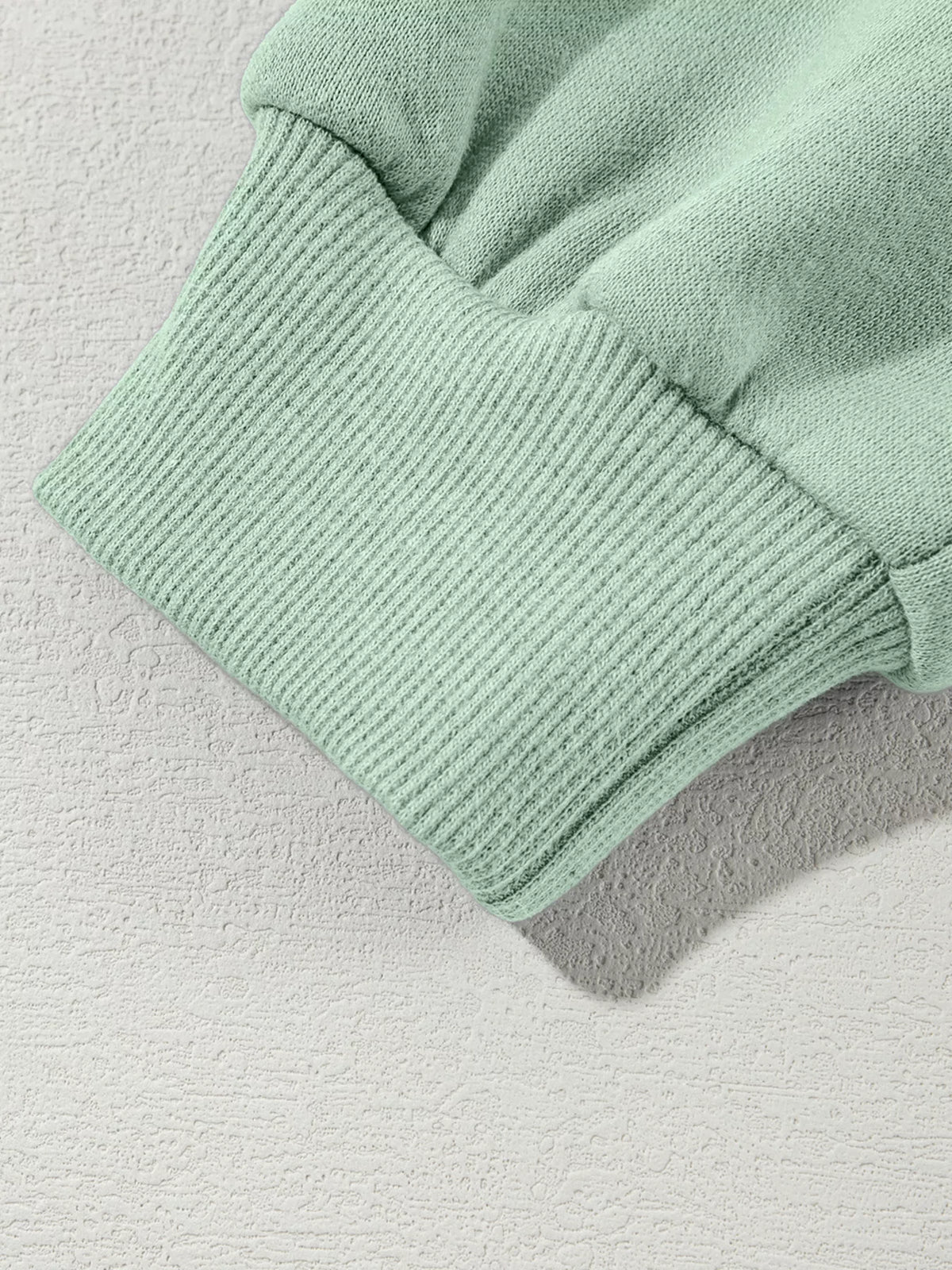 Women's Zip Up Jogger Set in Sage on model showing pockets