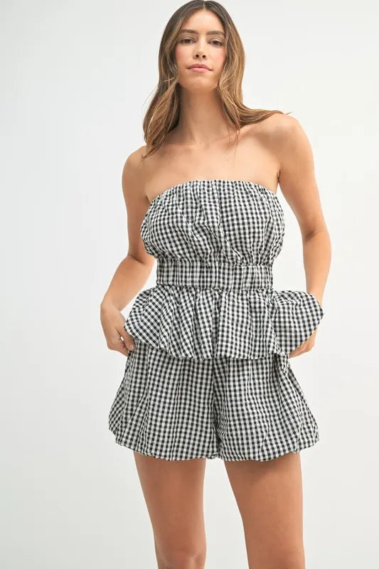 MABLE Gingham Tube Top and Shorts Set laid flat, showing the red and white checkered pattern and adjustable tie details.