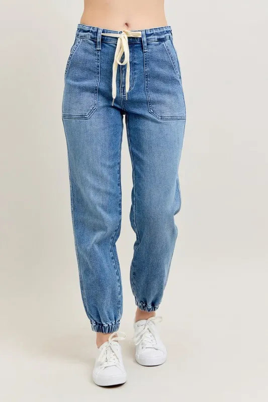 Judy Blue High Waist Denim Jogger in blue wash on model