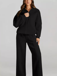 Women's Zip Up Jogger Set in Black on model showing pockets