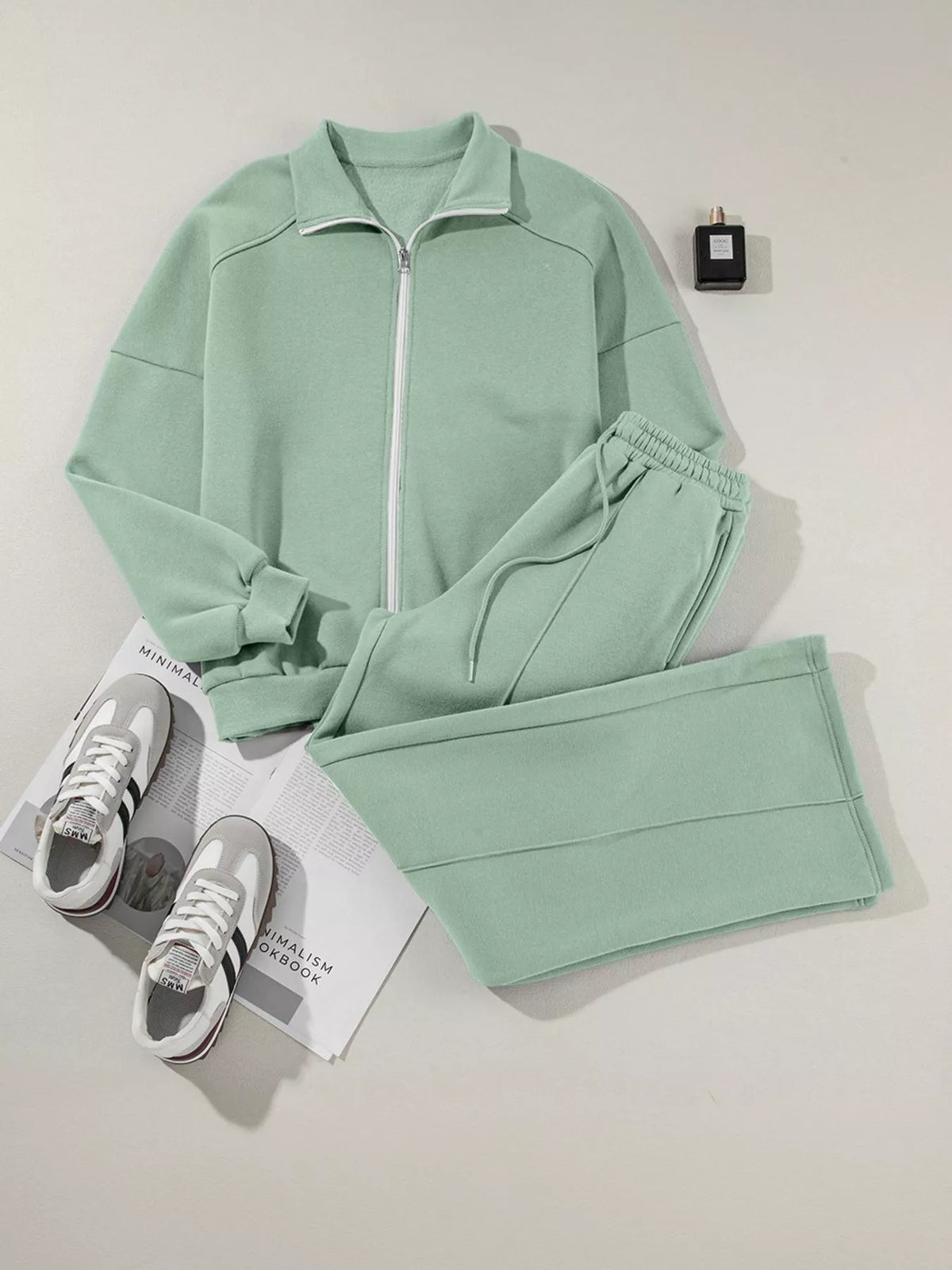 Women's Zip Up Jogger Set in Sage on model showing pockets