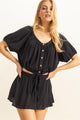 HYFVE Drawstring Hem Short Sleeve Top and Skirt Set outfit worn by a model