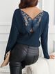 Lace Detail Butterfly Back Round Neck Long Sleeve T-Shirt in [color], featuring delicate lace accents on the back and a comfortable round neck design.