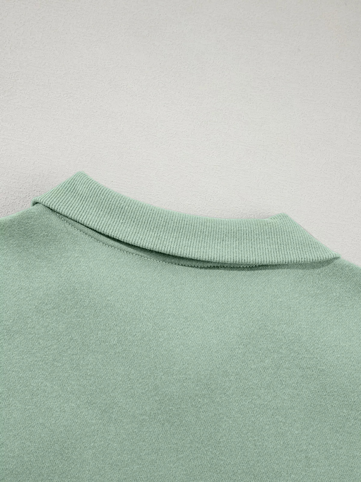 Women's Zip Up Jogger Set in Sage on model showing pockets