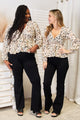 Honey Printed Tied Plunge Peplum Blouse Trandify deal