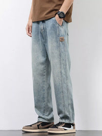 Men's Relaxed Fit Jeans in classic blue wash, comfort stretch fabric for all-day wear