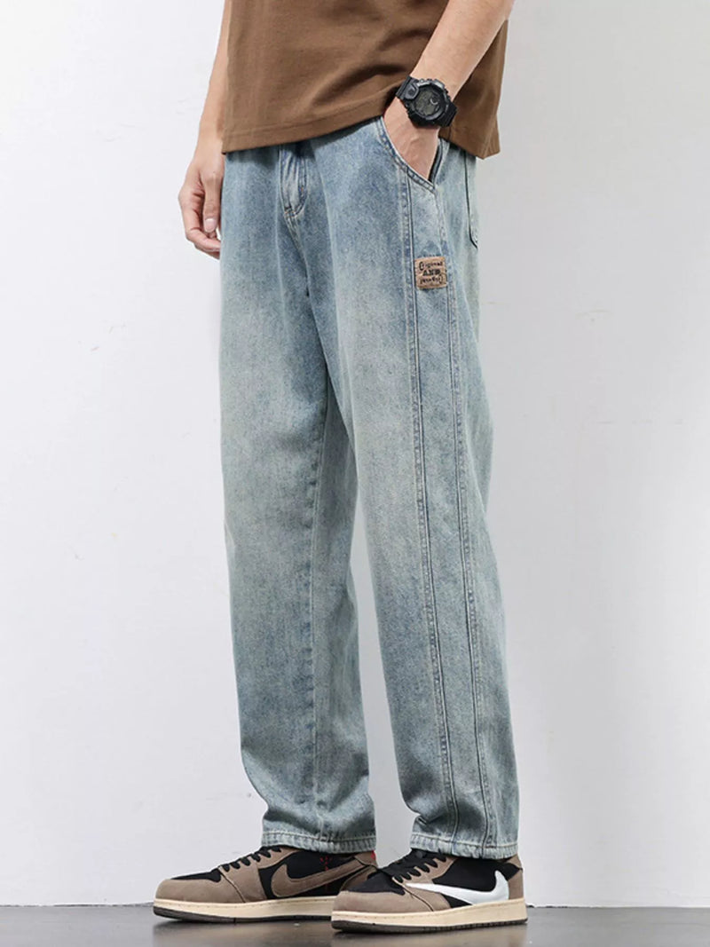 Men's Relaxed Fit Jeans in classic blue wash, comfort stretch fabric for all-day wear
