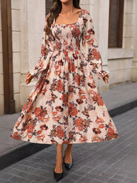 Women's ruffled sleeve dress styled with sandals for a summer outing