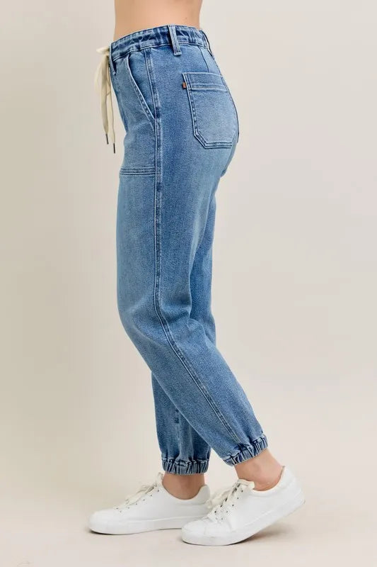 Judy Blue High Waist Denim Jogger in blue wash on model