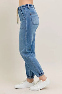 Judy Blue High Waist Denim Jogger in blue wash on model