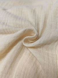 Women's plus size cotton drawstring wide leg pants, showing relaxed fit and tie waist.