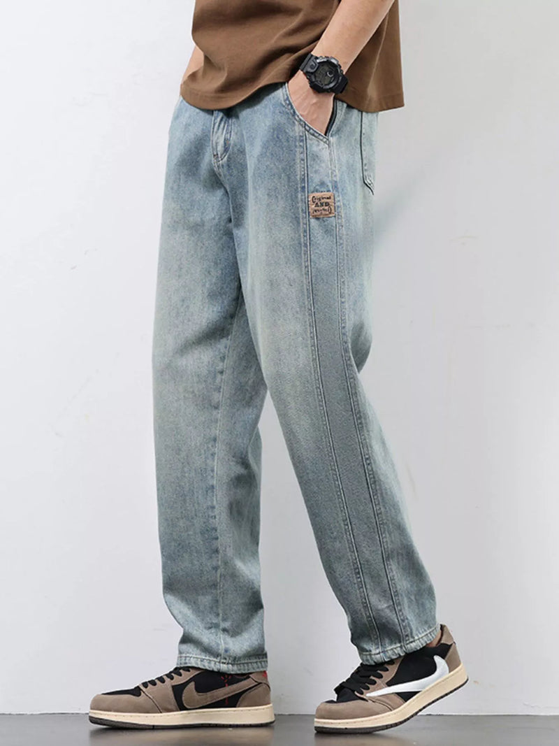 Men's Relaxed Fit Jeans in classic blue wash, comfort stretch fabric for all-day wear