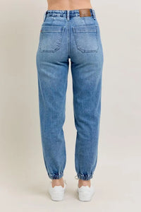 Judy Blue High Waist Denim Jogger in blue wash on model