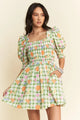 Fruits Smocking Mini Dress with floral pattern and smocked bodice by Davi & Dani