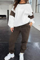 Women's Oversized Loungewear Set in White, featuring a drop-shoulder sweatshirt and matching joggers on a model.