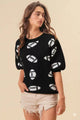 Oversized Football Sweater for Women - Vintage white and black striped pullover on model