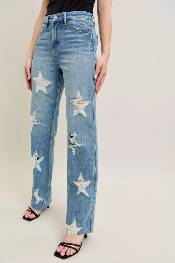 Judy Blue 90s Straight Jeans in a distressed wash, modeled from the front, showing the high waist and straight leg fit.