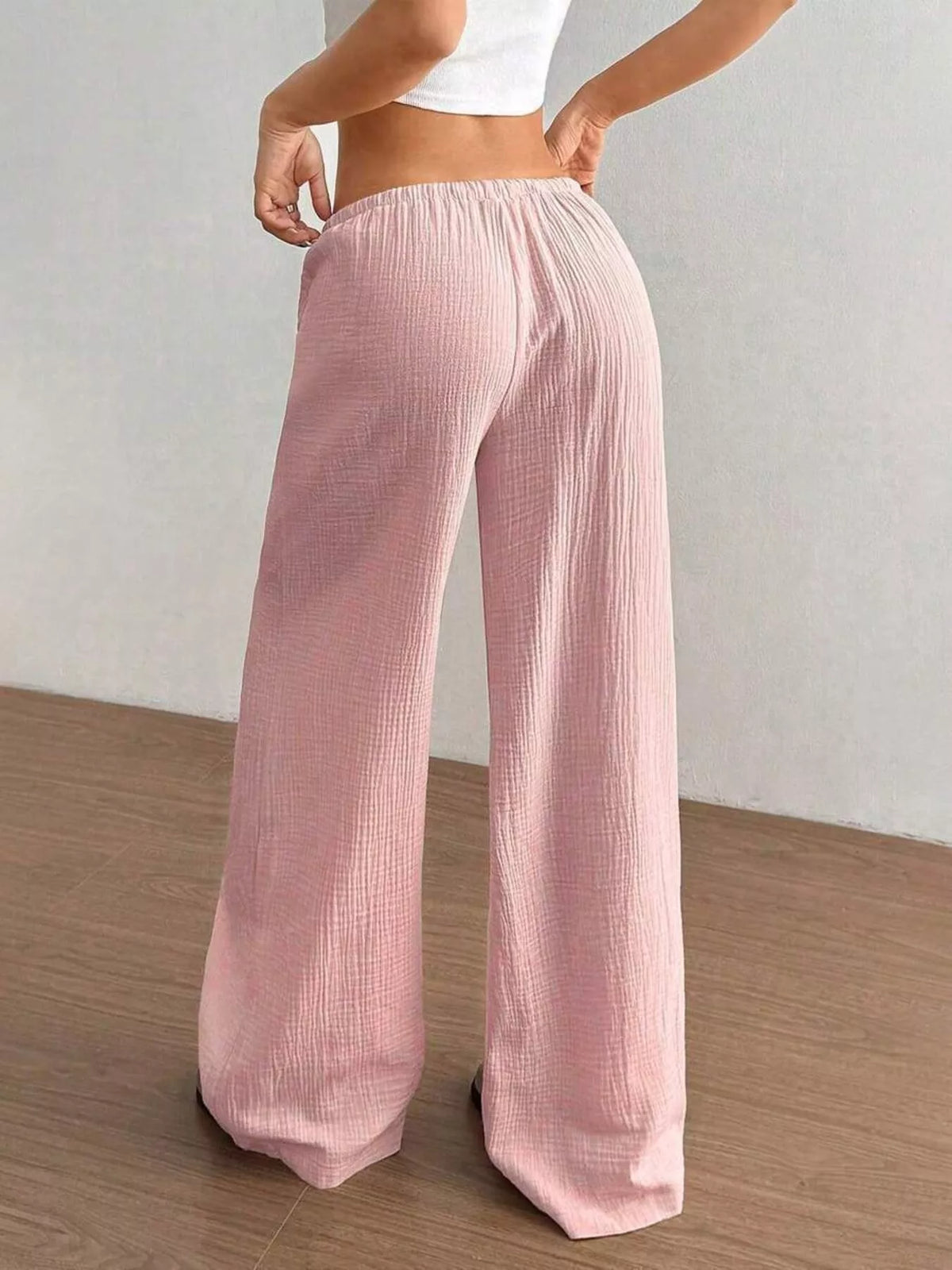Women's plus size cotton drawstring wide leg pants in Pink, showing relaxed fit and tie waist.
